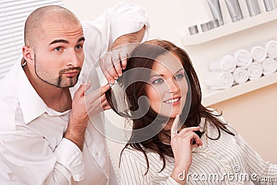 Professional hairdresser choose hair dye color Stock Photo