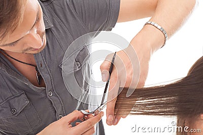 Professional hairdresser with long hair model Stock Photo