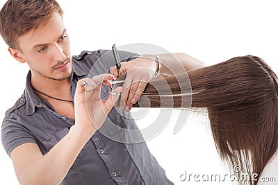 Professional hairdresser with long hair model Stock Photo