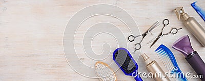 Professional hairdresser tools on wooden surface with copyspace at left Stock Photo