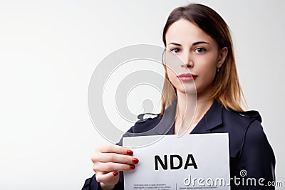 Professional, holds agreement, lawyer's seriousness indisputable Stock Photo