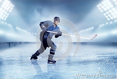 Professional ice hockey player shooting Stock Photo