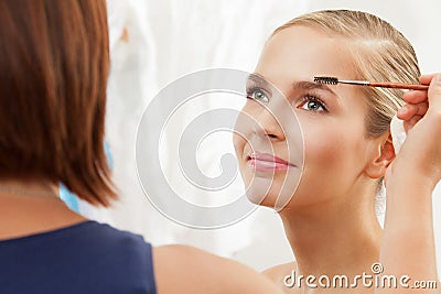 Professional makeup artist working Stock Photo