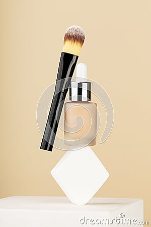 Professional makeup products levitate and balance on white sponge on stand. Bottle foundation liquid bb cream, accessory Stock Photo