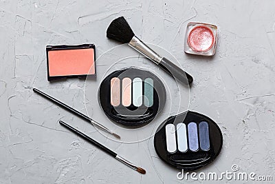 Professional makeup tools. Top view. Flat lay. Beauty, decorative cosmetics. Makeup brushes set and color eyeshadow Stock Photo