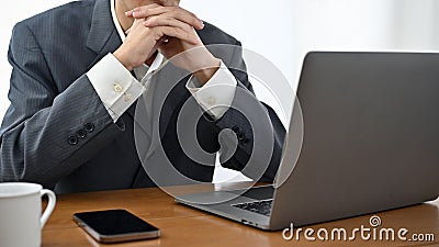 Professional male banker or businessman in a serious and formal meeting, thinking and planning Stock Photo