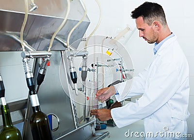 Professional man working on quality of products Stock Photo