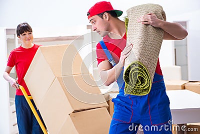 The professional movers doing home relocation Stock Photo