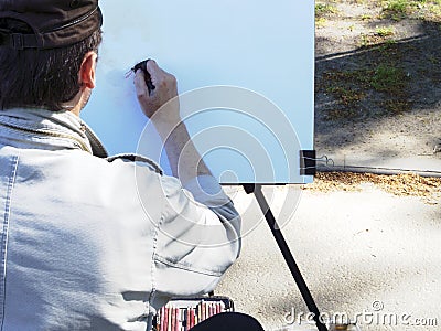 Professional painter at work Editorial Stock Photo