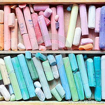 Professional pastel crayons in wooden artist box closeup, top vi Stock Photo