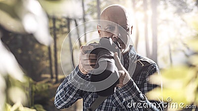 Photographer shooting in the wilderness Stock Photo