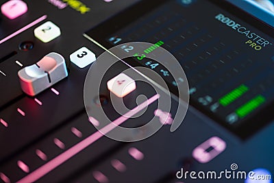 Professional podcast mixing console with faders and adjusting buttons, Audio sound mixer console. Sound mixing desk. Music mixer c Stock Photo