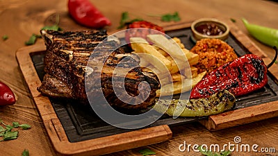 Professional product shot of meat serving plate on the table Stock Photo