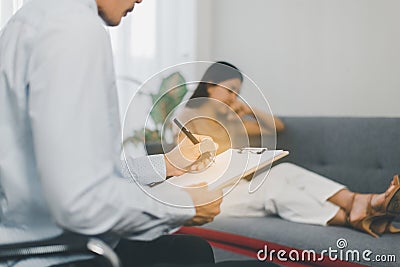 Professional psychiatrist talking and counsel to woman patient,Suicide Prevention,Medical conditions,Mental health care concept,Be Stock Photo