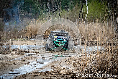 Professional quad biker rides fast on sand. Quad racing, ATV 4x4 Editorial Stock Photo