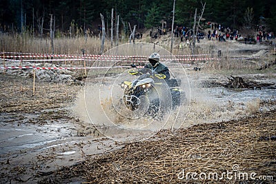 Professional quad biker rides fast on sand. Quad racing, ATV 4x4 Stock Photo