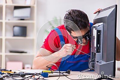 The professional repair engineer repairing broken tv Stock Photo
