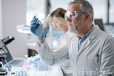 Professional researcher holding a test tube Stock Photo