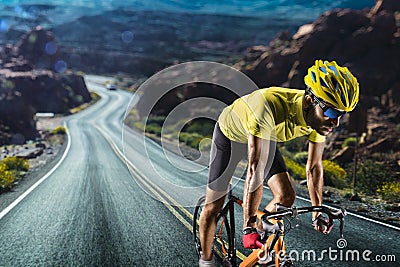 Professional road bicycle racer in action Stock Photo