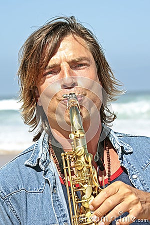 Professional saxophone playe Stock Photo