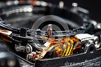 Professional service and maintenance of photographic equipment. Disassembled camera close-up Stock Photo
