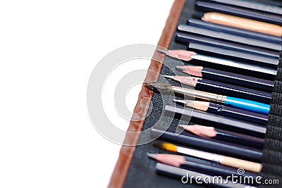 Professional set of charcoal pencils for artistic drawing on an isolated white background close-up. Stock Photo