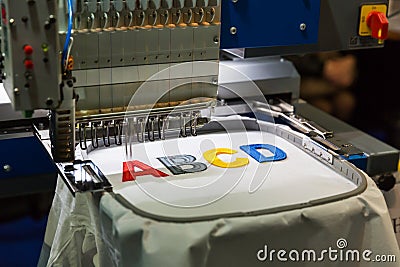 Professional sewing machine embroidery letters Stock Photo