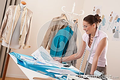 Professional tailor working with fashion sketches Stock Photo