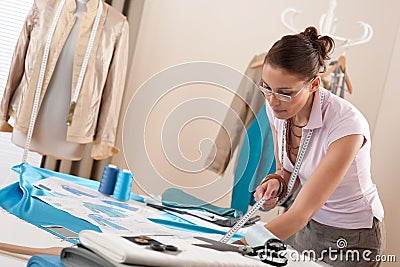 Professional tailor working with fashion sketches Stock Photo