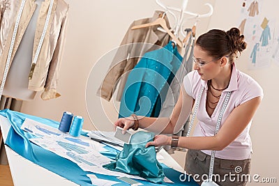 Professional tailor working with fashion sketches Stock Photo