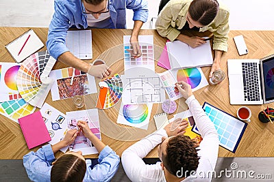 Professional team of interior designers working at table Stock Photo