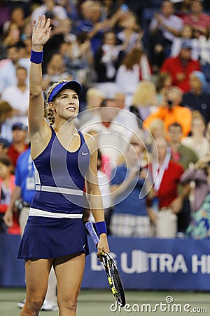 Professional tennis player Eugenie Bouchard celebrates victory after third round march at US Open 2014 Editorial Stock Photo