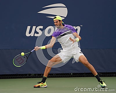 Professional tennis player Karen Khachanov of Russia in action during his 2019 US Open first round match Editorial Stock Photo