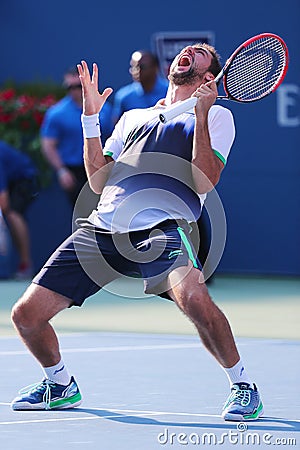 Professional tennis player Marin Cilic celebrates victory after US Open 2014 quarterfinal match Editorial Stock Photo