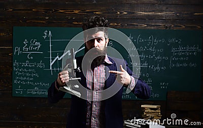 Professional tutors are experts in their academic content. E-learning. Hipster is solving math exam. Mentor needs to Stock Photo