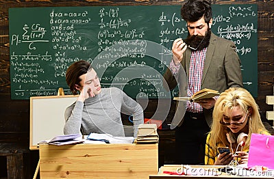 Professional tutors are experts in their academic content. People learning education and school concept - students hands Stock Photo