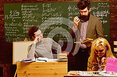 Professional tutors are experts in their academic content. People learning education and school concept - students hands Stock Photo