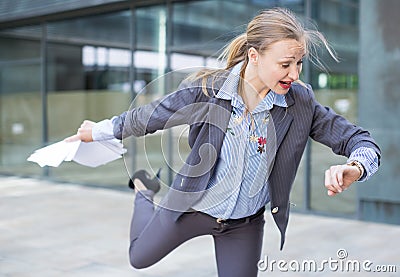 Professional woman hurrying to meeting Stock Photo