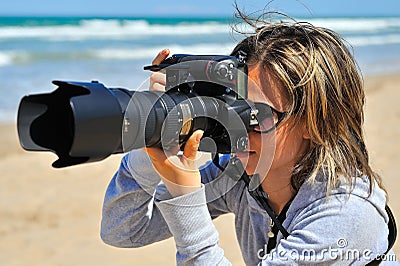 Professional woman photographer Stock Photo