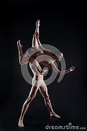 Professional young gymnasts dancing in the studio Stock Photo