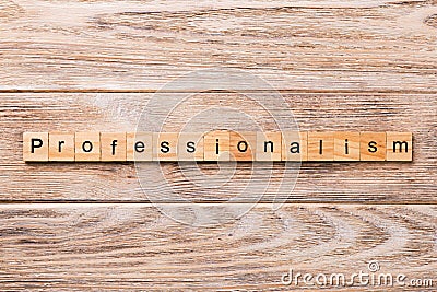 Professionalism word written on wood block. Professionalism text on wooden table for your desing, concept Stock Photo