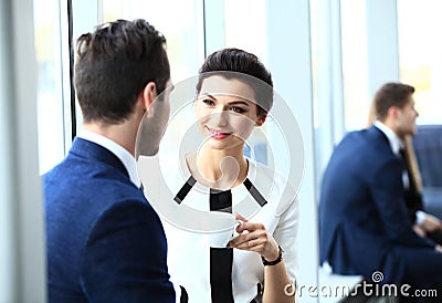 Professionals chatting during a coffee break Stock Photo
