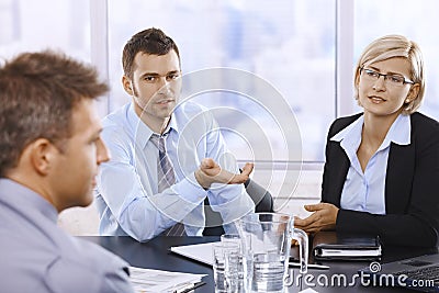 Professionals at discussion Stock Photo