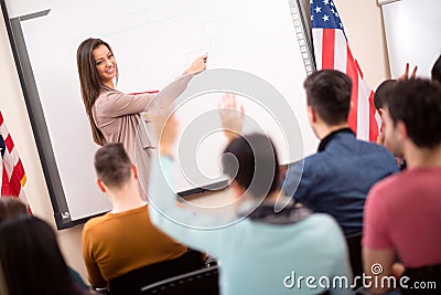 Professor explain to students in the classroom Stock Photo