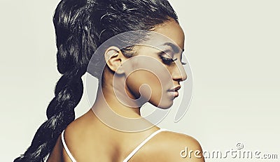 Profile of beautiful young woman braids Stock Photo