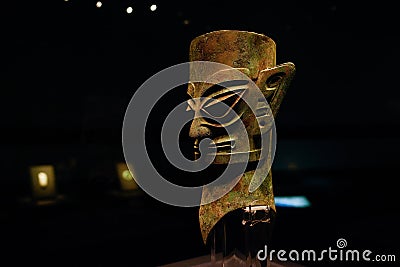 Profile of bronze human head,Shang dynasty,Chengdu Museum Editorial Stock Photo