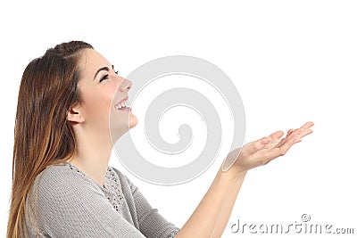 Profile of a happy woman holding something blank Stock Photo