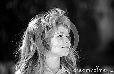 Profile kids face. Portrait of adorable little boy on green background park in nature. Wow look. Portrait of amazed cute Stock Photo