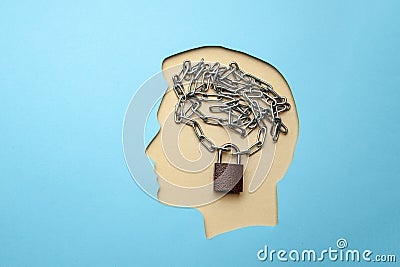 Profile of man with brain in the form of chain and a closed lock. Privacy Policy Stock Photo