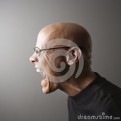 Profile of man screaming. Stock Photo